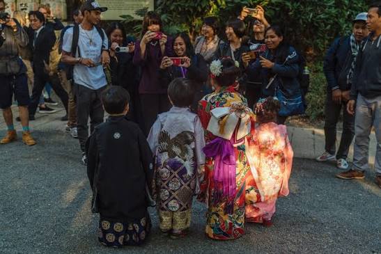 Young children dressed in traditional kimono visiting Hie Shrine for Shichi-Go-San