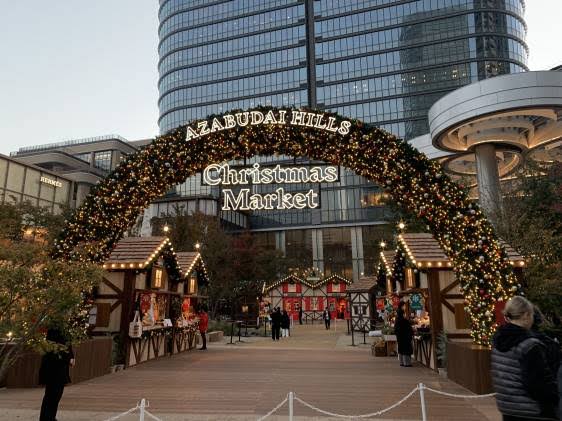 German Christmas market wooden stalls and festive lights at Toyosu Seaside Park